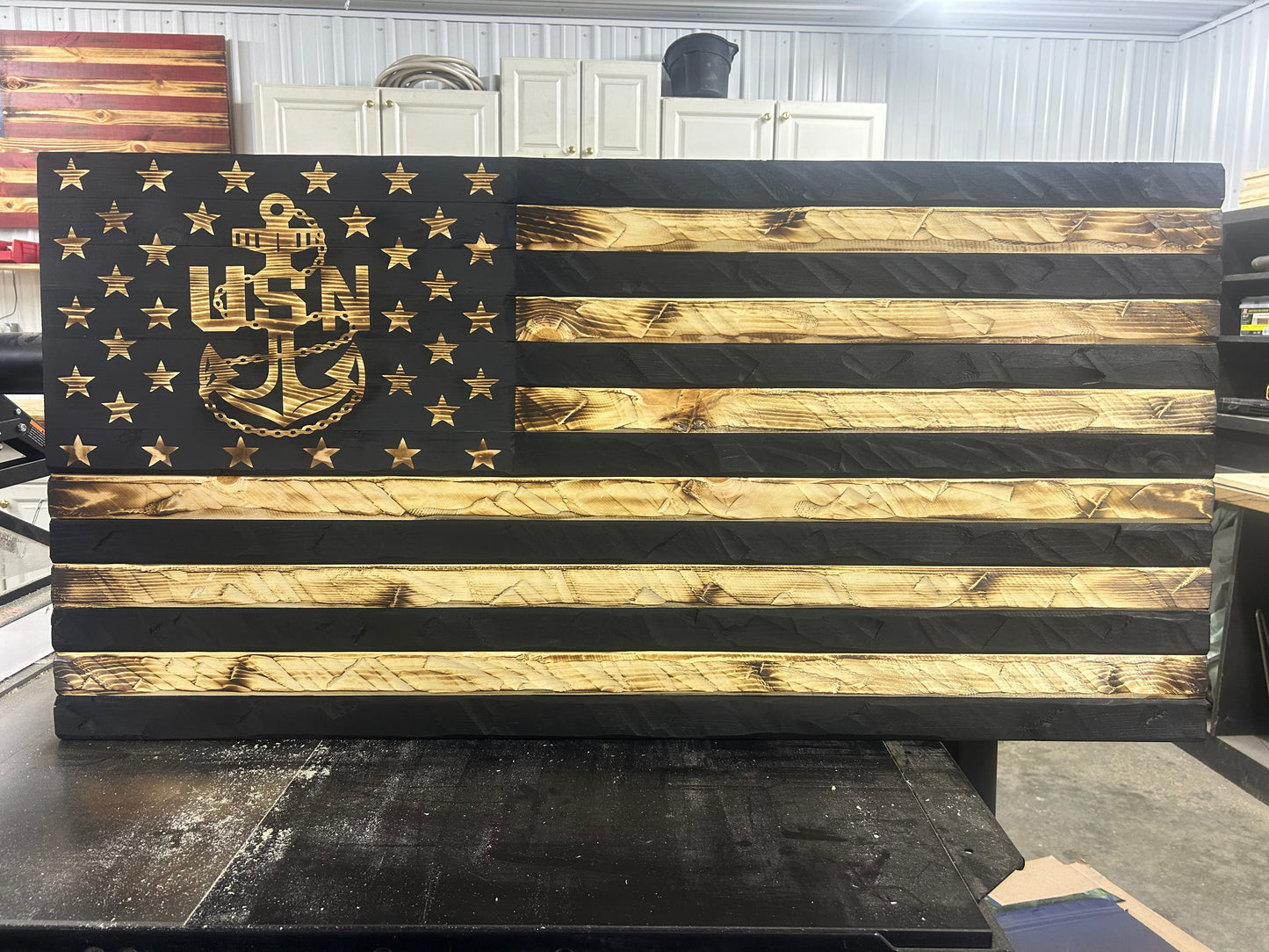 The Hand-Carved Navy Heritage Flag