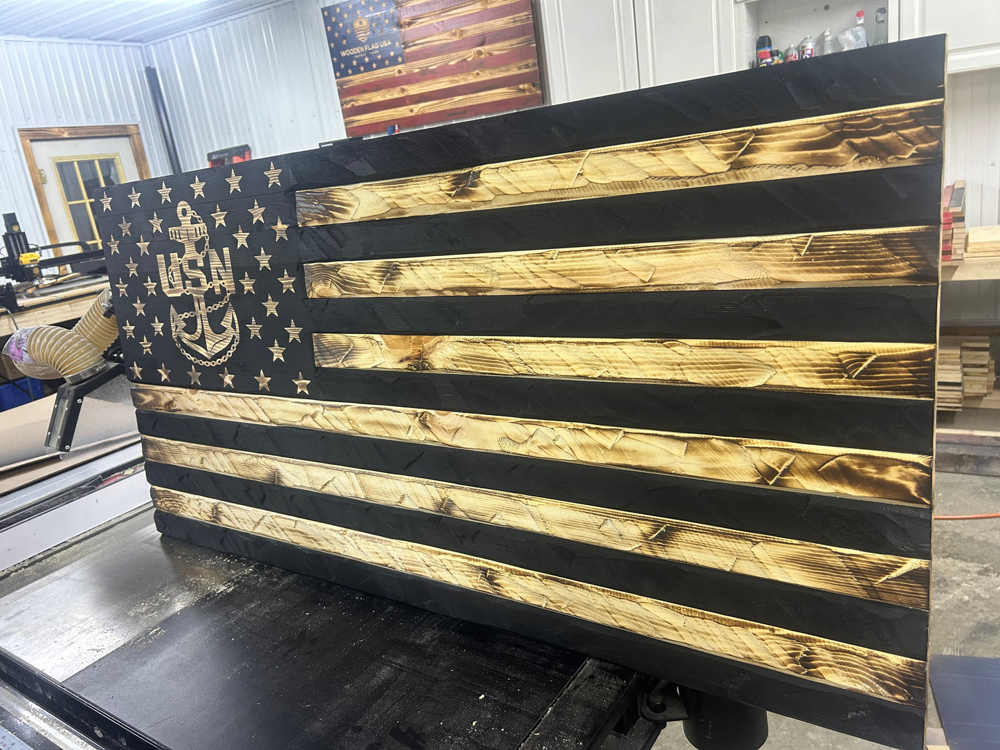 The Hand-Carved Navy Heritage Flag
