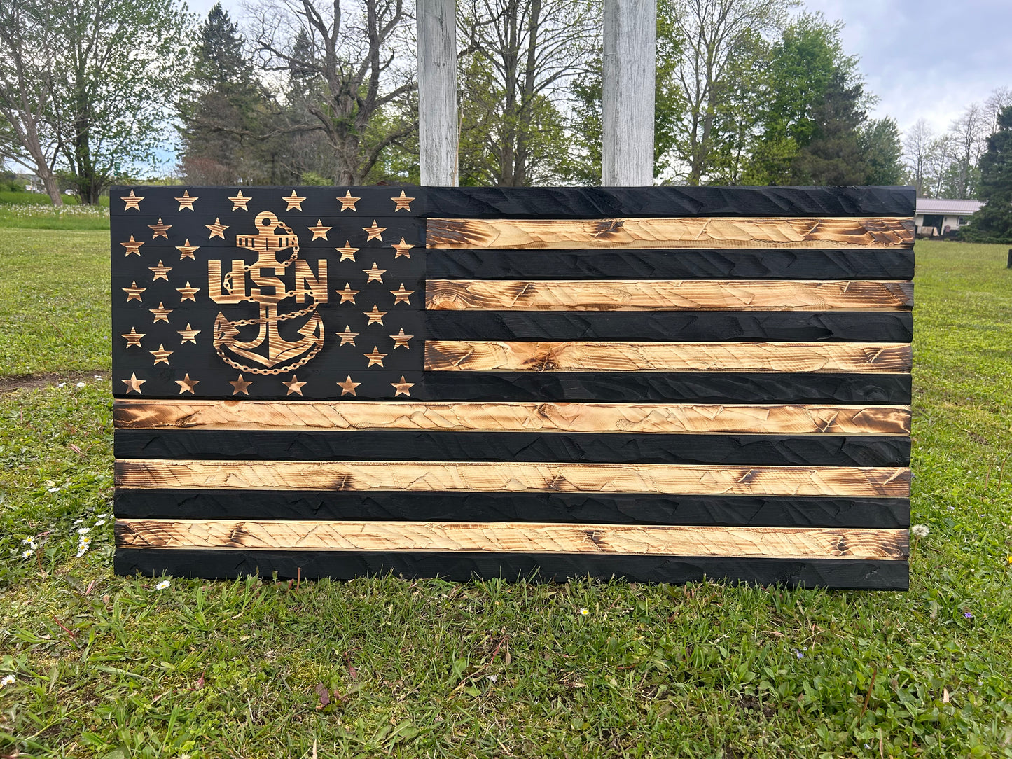 The Hand-Carved Navy Heritage Flag